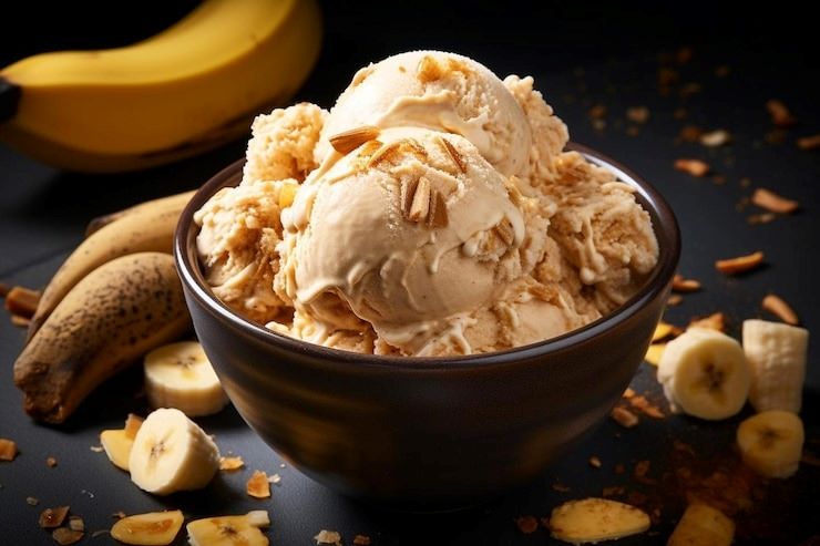 Este sorvete é uma deliciosa opção vegana, cremosa e saudável para quem gosta de sorvete, mas quer evitar ingredientes de origem animal e açúcares refinados. Ingredientes: 4 bananas maduras congeladas 2 colheres de sopa de cacau branco em pó 1 colher de sopa de manteiga de amêndoas 1 colher de sopa de xarope de bordo ou calca de agave azul 1/2 colher de chá de essência de baunilha Amêndoas picadas para servir Modo de preparo: Coloque as bananas congeladas em um processador de alimentos e bata até que fiquem com uma textura cremosa. Adicione o cacau em pó, a manteiga de amêndoas, o xarope de bordo ou calca de agave azul e a essência de baunilha. Bata novamente até que todos os ingredientes estejam bem misturados. Transfira o sorvete para um recipiente e leve ao congelador por pelo menos duas horas. Na hora de servir, retire o sorvete do congelador e deixe descansar por alguns minutos. Sirva com as amêndoas picadas por cima. Este sorvete é uma opção deliciosa e saudável para quem busca uma sobremesa mais leve e nutritiva. As bananas congeladas conferem a textura cremosa, enquanto o cacau em pó adiciona um sabor intenso de chocolate. A manteiga de amêndoas adiciona um sabor rico e cremoso, enquanto o xarope de bordo ou melado de cana adicionam um leve toque doce. Sirva com amêndoas picadas por cima para dar um toque crocante e saboroso.